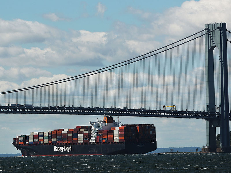 A cargo ship leaves New York Harbour. The US trade gap widened in August, according to the latest figures from the US Commerce Department